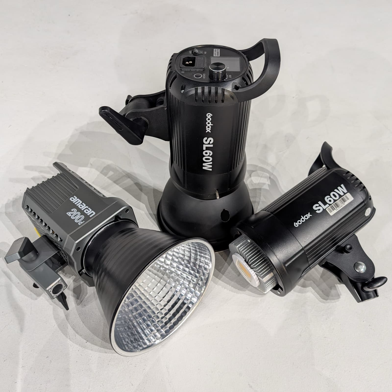 Two Godox SL60 LEDs and an Amaran 200d